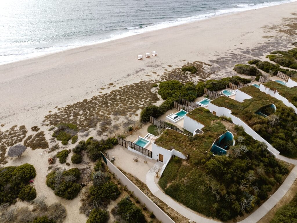 Beachfront homes and pools beside the sea in Baja California Sur, Mexico